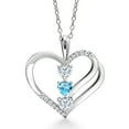 thumbnail image 1 of Gem Stone King 925 Sterling Silver White Moissanite and Swiss Blue Topaz 3-Stone Pendant Necklace for Women (0.89 Cttw, Gemstone Birthstone, Heart Shape 4MM, with 18 inch Silver Chain), 1 of 3