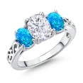 thumbnail image 1 of Gem Stone King 925 Sterling Silver White Moissanite and Blue Opal Filigree Style 3 Stone Ring for Women (2.50 Cttw, Oval 8X6MM and 6X4MM) (Size 6), 1 of 6