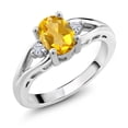 thumbnail image 1 of Gem Stone King 925 Sterling Silver Yellow Citrine and White Moissanite 3 Stone Engagement Ring for Women | 1.38 Cttw | Oval 8X6MM | Round 2MM | Gemstone November Birthstone | Size 5, 1 of 6
