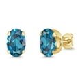 thumbnail image 1 of Gem Stone King Oval 7x5mm London Blue Topaz 1.80 Ct 18K Yellow Gold Plated Silver Stud Earrings for Women Men, 1 of 3
