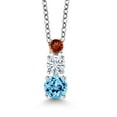thumbnail image 1 of Gem Stone King Swiss Blue Topaz White Moissanite Red Garnet 3 Stone Pendant Necklace for Women (1.03 cttw, Gemstone Birthstone, Round 5MM, 4MM and 3MM, with 18 inch Chain), 1 of 3