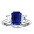 thumbnail image 1 of GemsNY September Birthstone - Three Stone Ring Emerald Cut Blue Sapphire with Prong Set Trapezoid Side Diamonds For Women (Grade - AAAA | 3.5cttw), 1 of 4