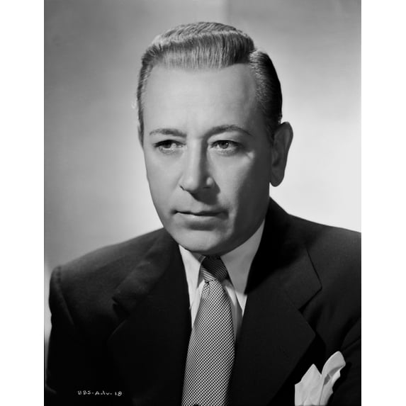 George Raft Posed in Suit with an Expressionless Face Photo Print (8 x 10)