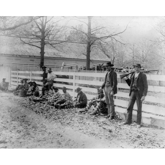 Georgia Chain Gang. Nchain Gang Prisoners And Guards Rest Against A Fence Thomasville Georgia. Photograph C1890.