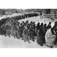 thumbnail image 1 of German Prisoners March Through The Snowy Streets Of Battered Stalingrad In Jan.-Feb. 1943. Wrapped In Blankets Or Anything Else To Protect From The Winter Weather History (24 x 18), 1 of 1