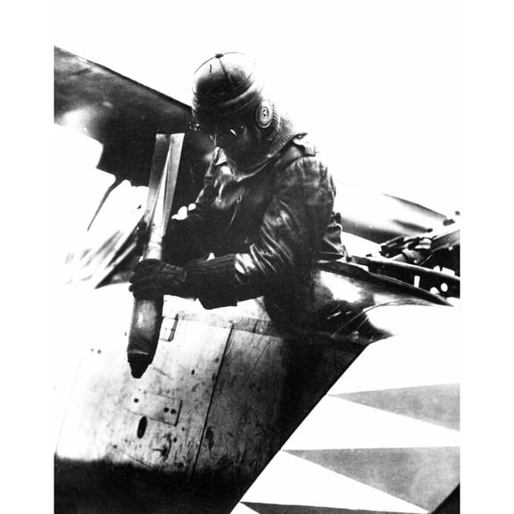 German World War I Aviator Dropping A Bomb Somewhere On The Western Front. 1914-1918. History