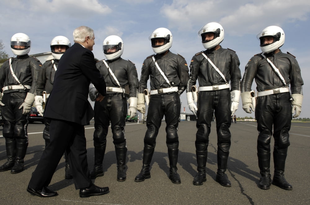 German motorcycle police shake hands with the Secretary of Defense Canvas Art - Stocktrek Images (34 x 23)