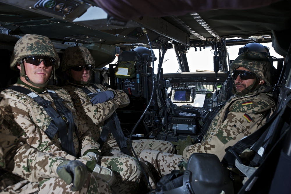 German soldiers seated in a UH-60L Blackhawk helicopter Canvas Art - Terry MooreStocktrek Images (35 x 24)