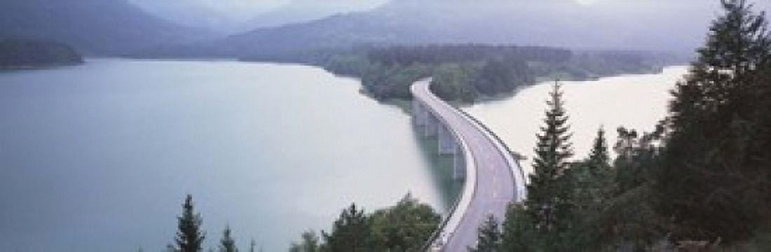 Germany Bavaria Bridge over Sylvenstein Lake Canvas Art - Panoramic Images (18 x 6)