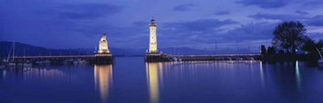Germany Lindau Reflection of Lighthouse in the lake Constance Canvas Art - Panoramic Images (18 x 6)