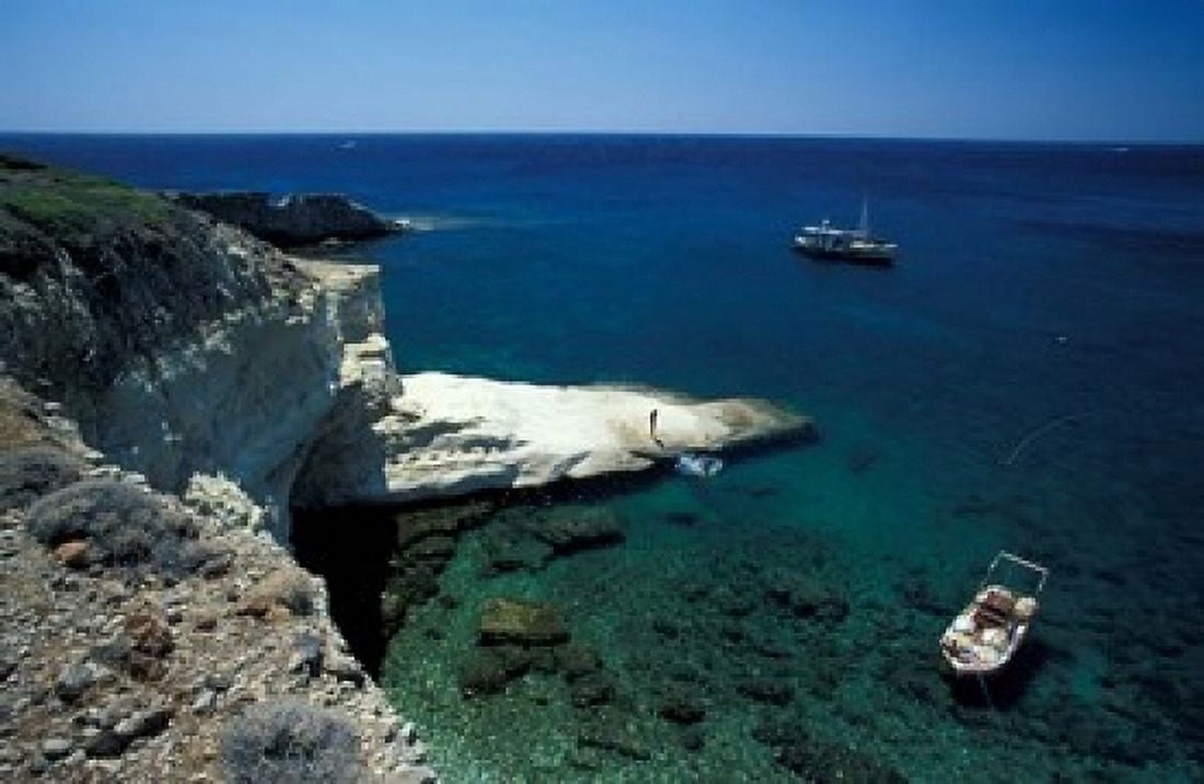 Gerontas White Sandstone Rock of Aegean Sea Milos Greece Canvas Art - Michele Molinari DanitaDelimont (18 x 12)