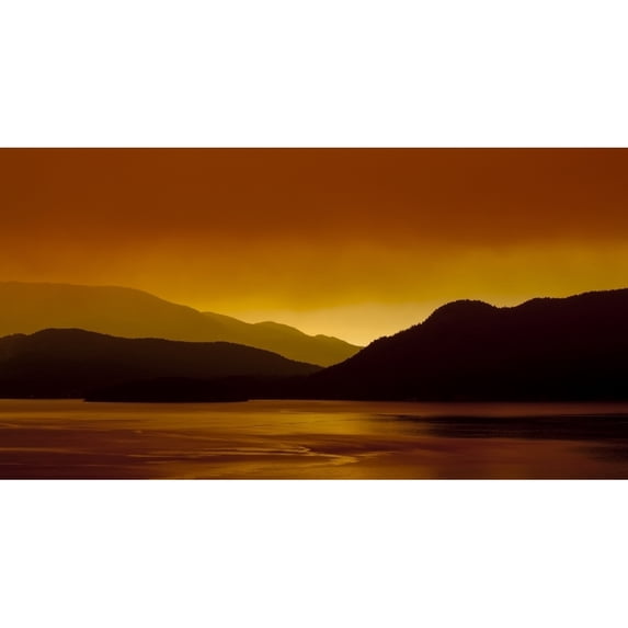 Gibsons Landing and the sky glowing red with forest fire smoke at sunrise Sunshine Coast; British Columbia Canada Poster Print by The