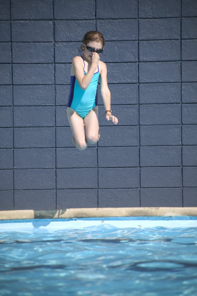 Girl Jumps Into The Pool Canvas Art - Kelly Redinger Design Pics (11 x 17)