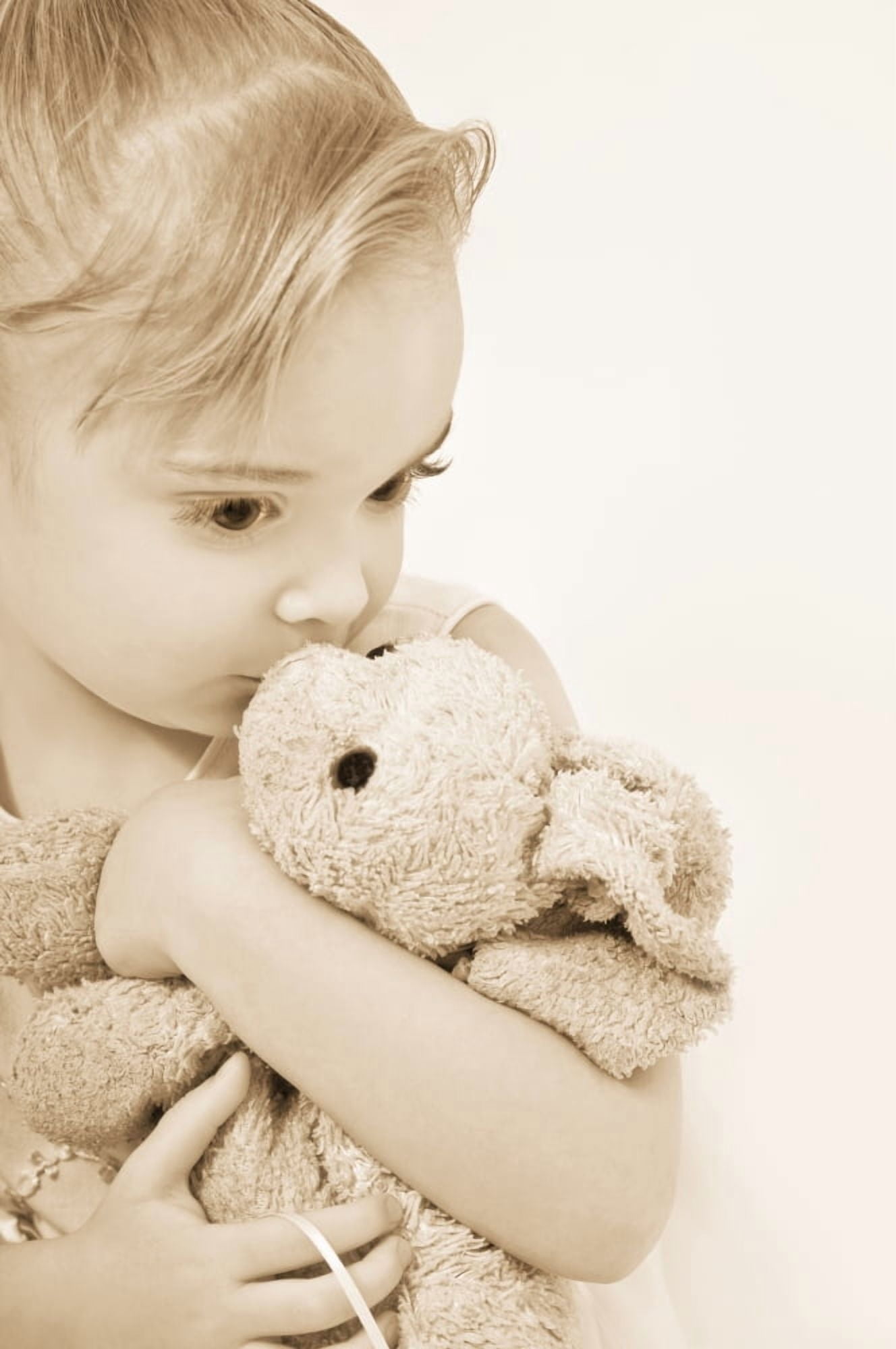 Girl Kissing Her Stuffed Animal Canvas Art - Chris and Kate Knorr Design Pics (12 x 18)