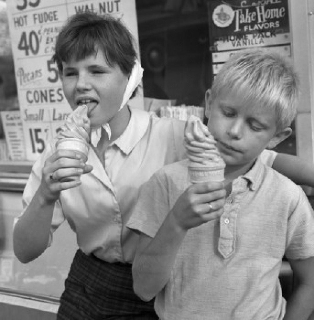 Girl and boy eating icecreams Canvas Art - (24 x 36)