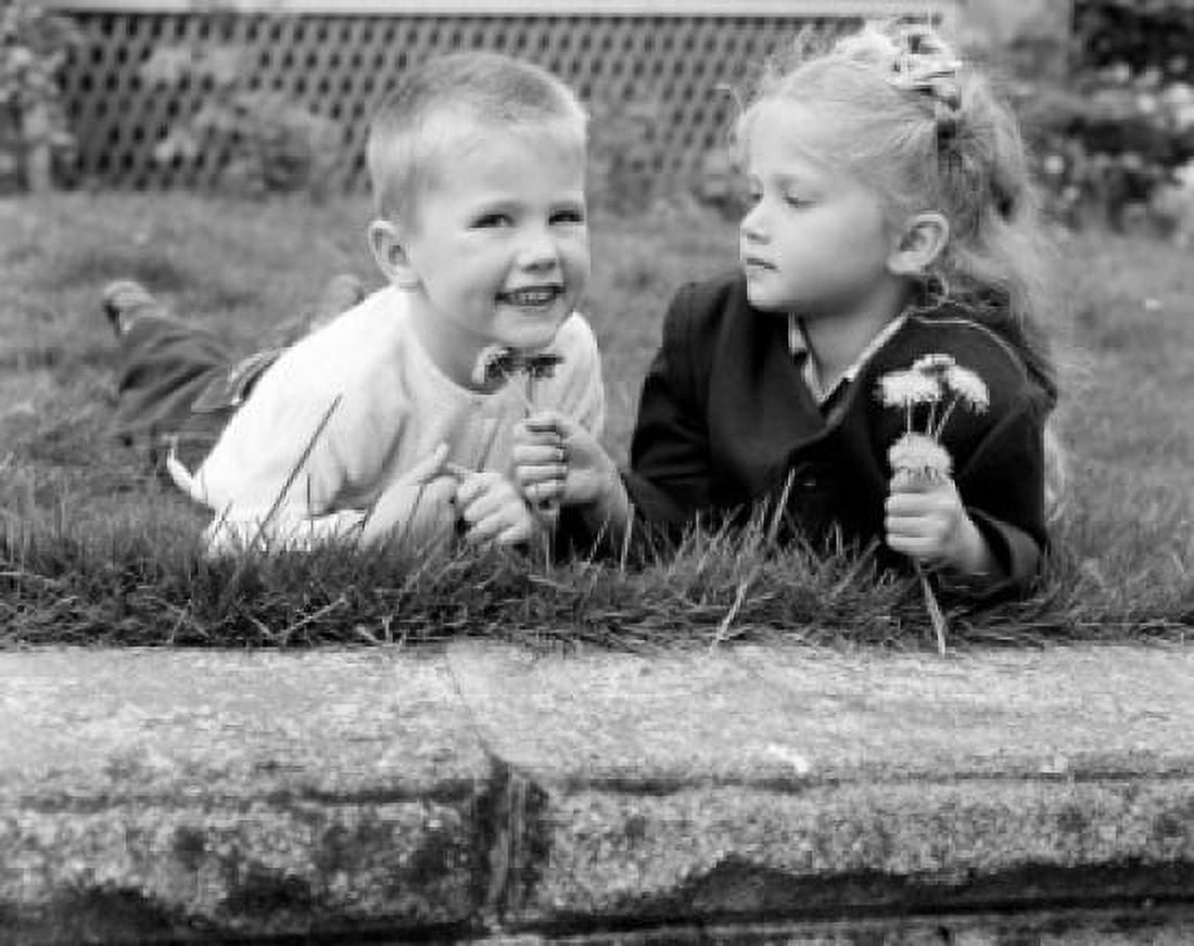 Girl and boy picking flowers Canvas Art - (18 x 24)