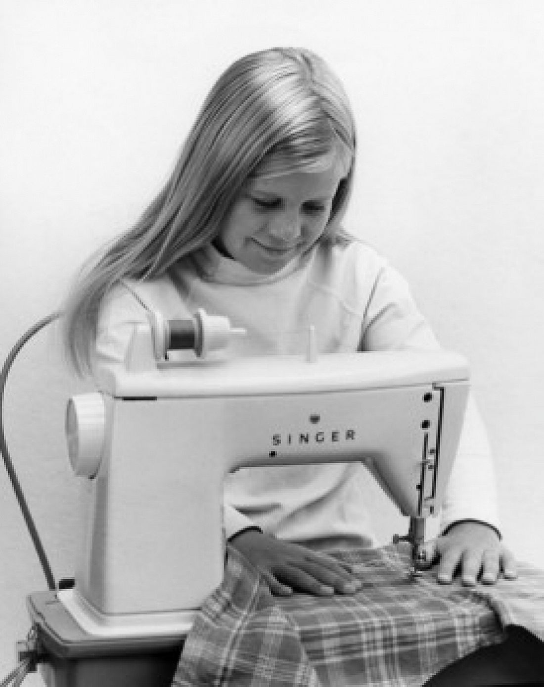 Girl at sewing machine Canvas Art - (24 x 36)