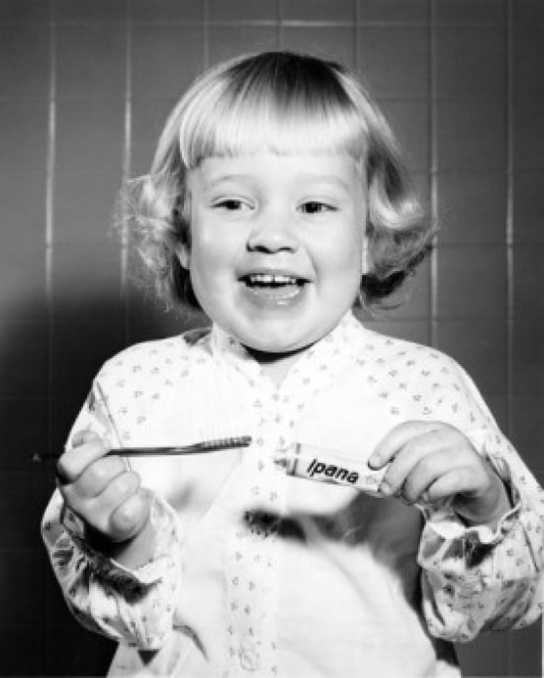 Girl brushing teeth Canvas Art - (18 x 24)