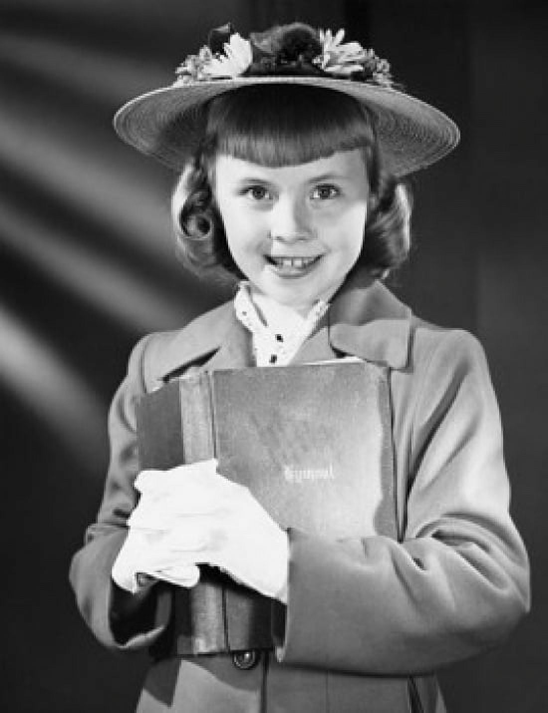 Girl carrying a Bible and smiling Canvas Art - (18 x 24)