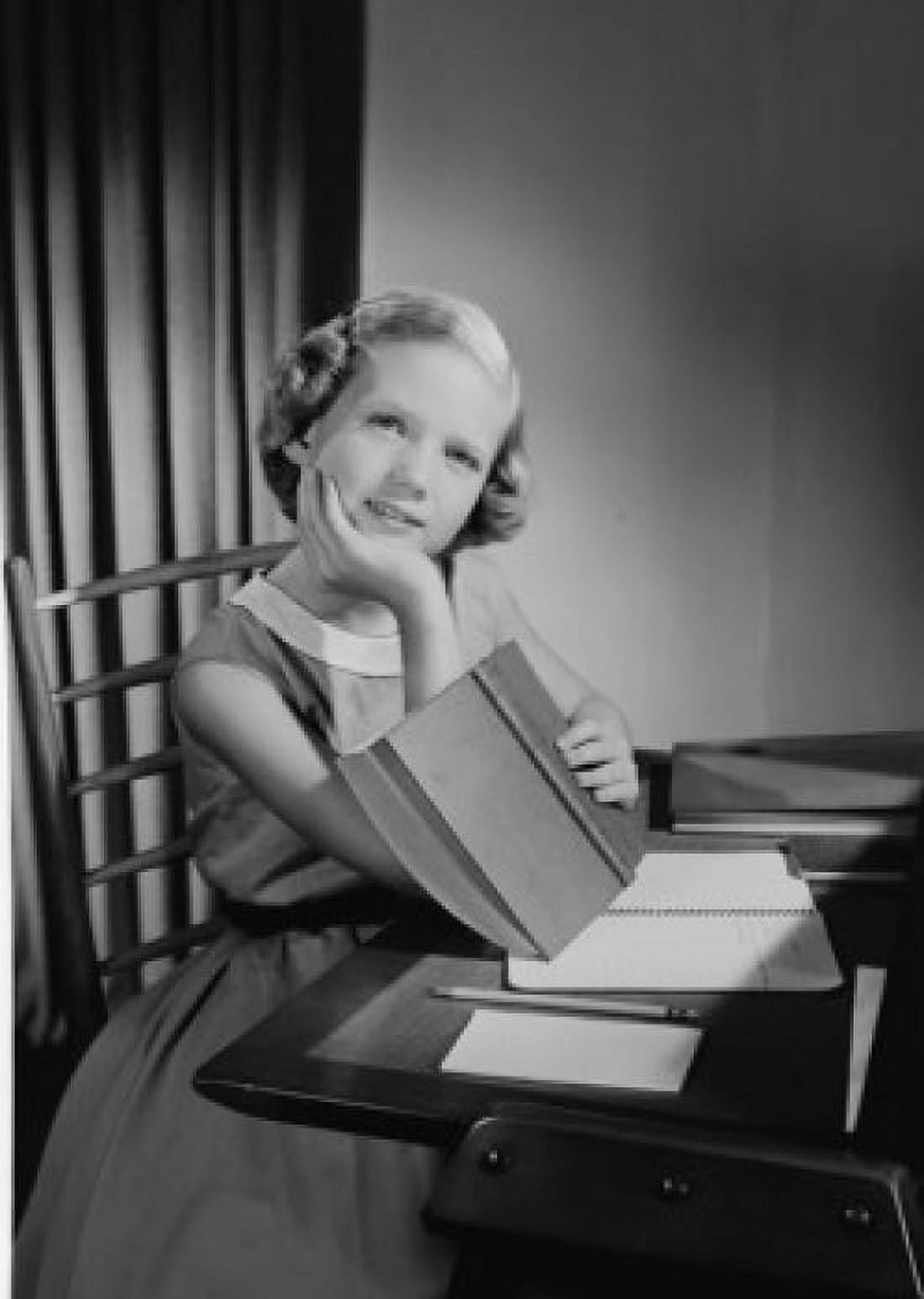Girl doing homework at desk Canvas Art - (24 x 36)