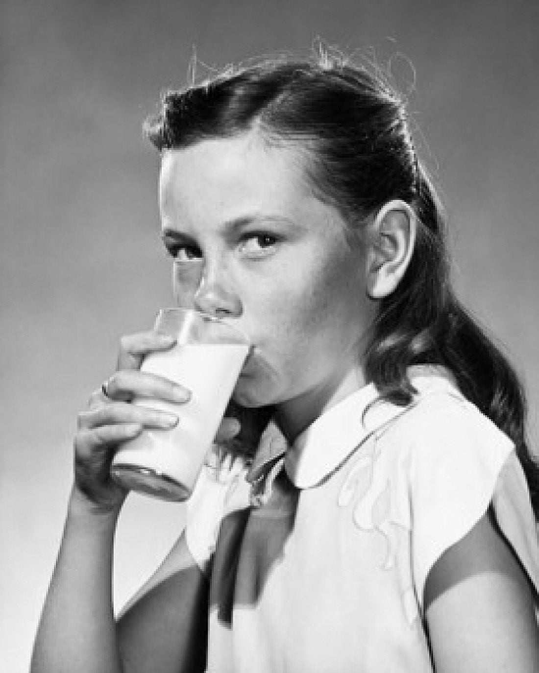 Girl drinking milk Canvas Art - (18 x 24)