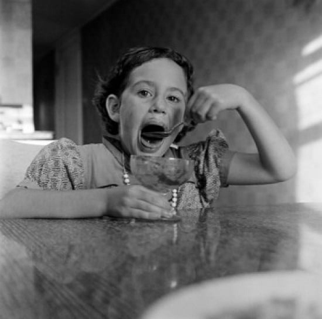 Girl eating ice cream Canvas Art - (18 x 24)