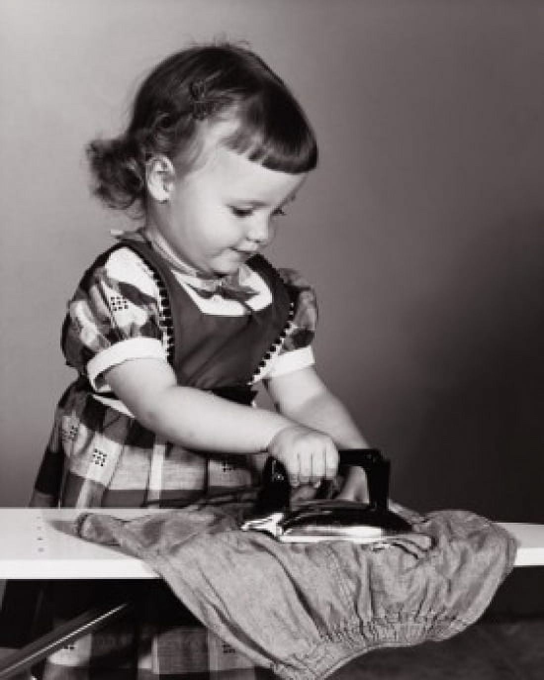 Girl ironing her dress Canvas Art - (18 x 24)