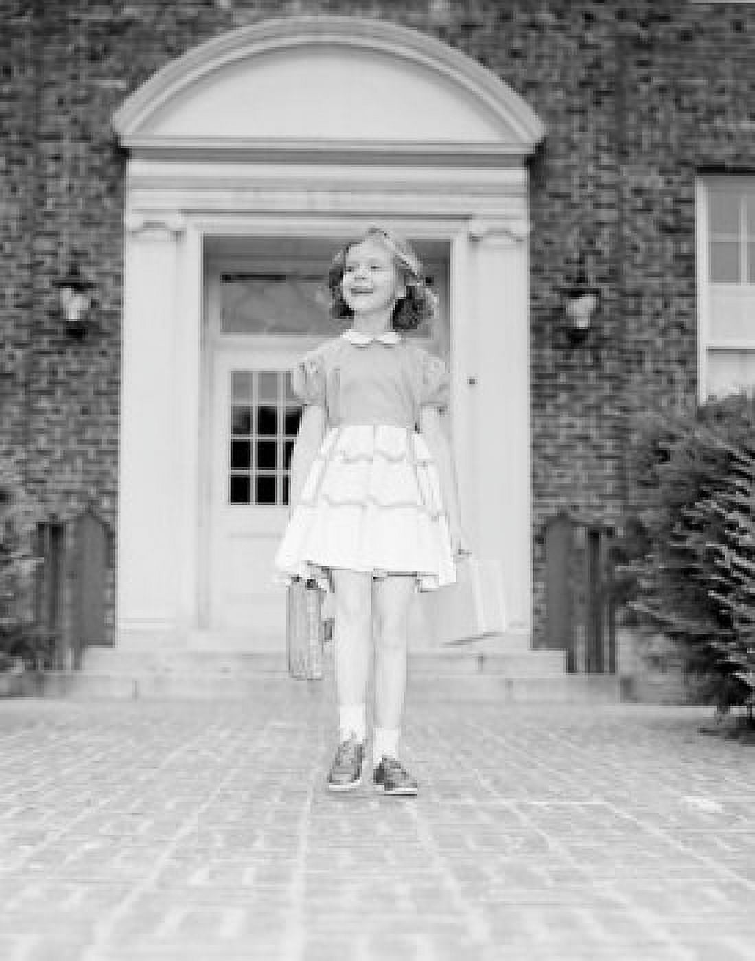 Girl leaving school building Canvas Art - (24 x 36)