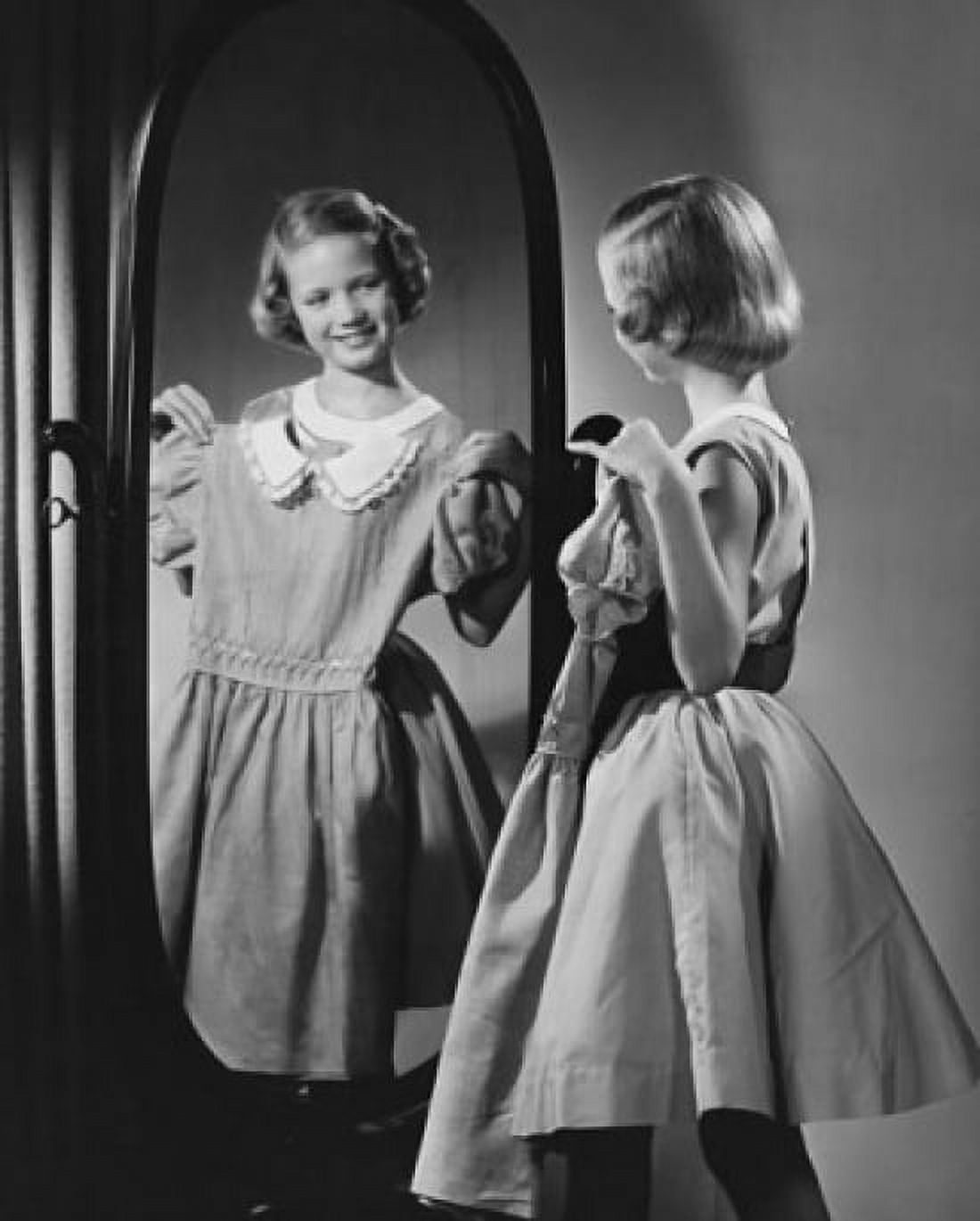 Girl looking at herself in the mirror Canvas Art - (18 x 24)