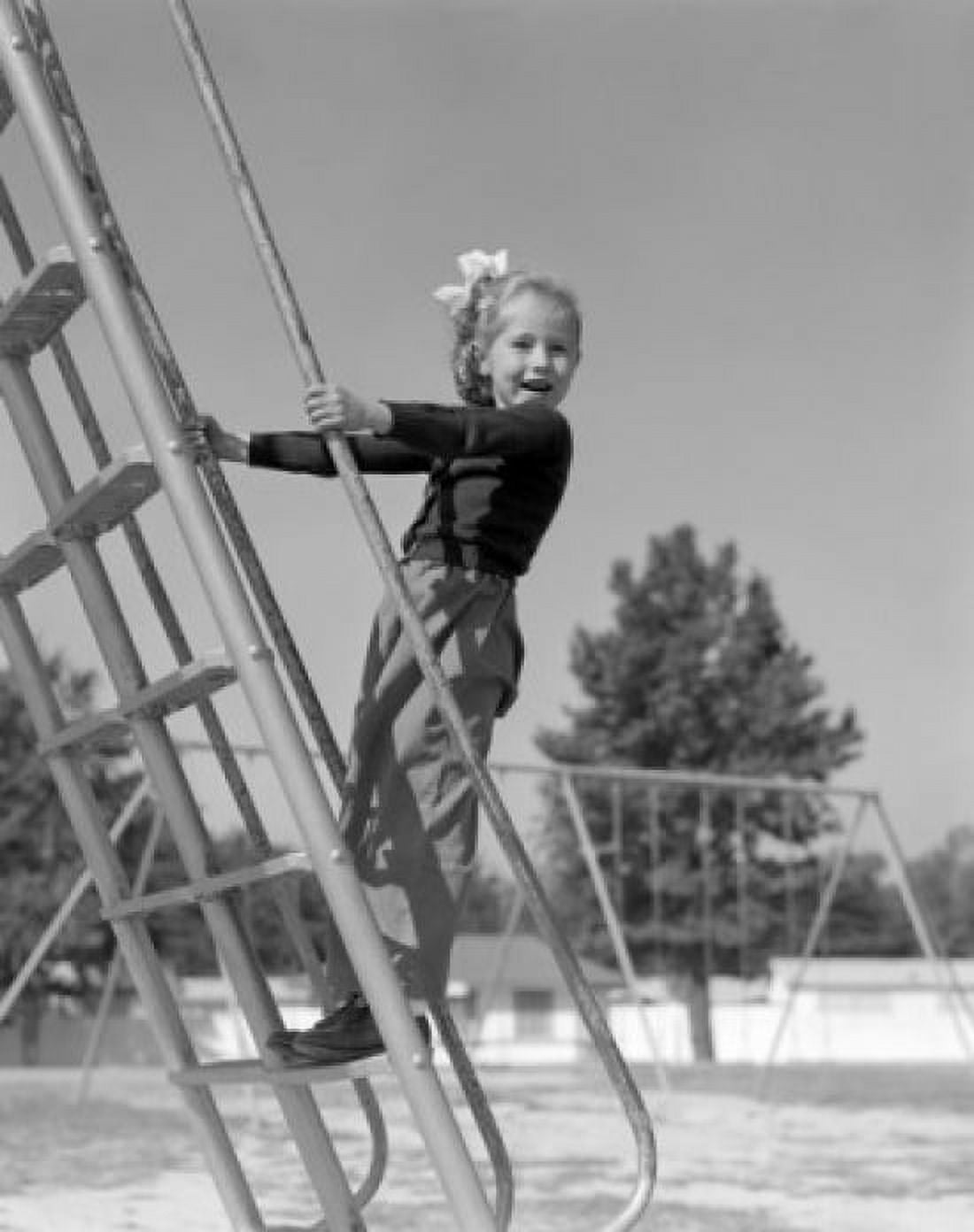 Girl on monkey bars in playground Canvas Art - (18 x 24)