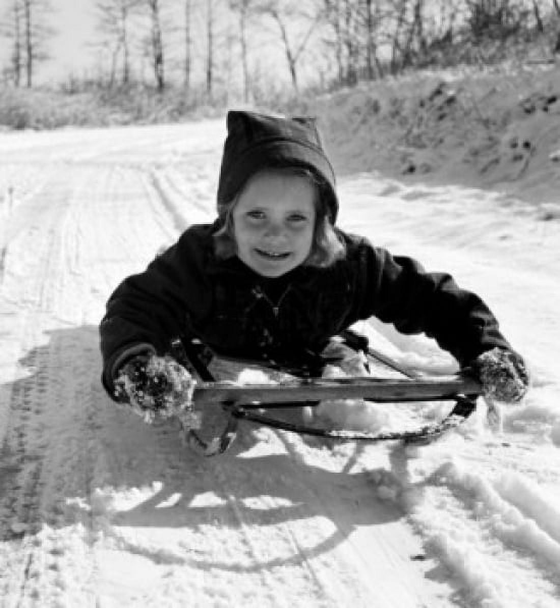 Girl on sledge Canvas Art - (24 x 36)