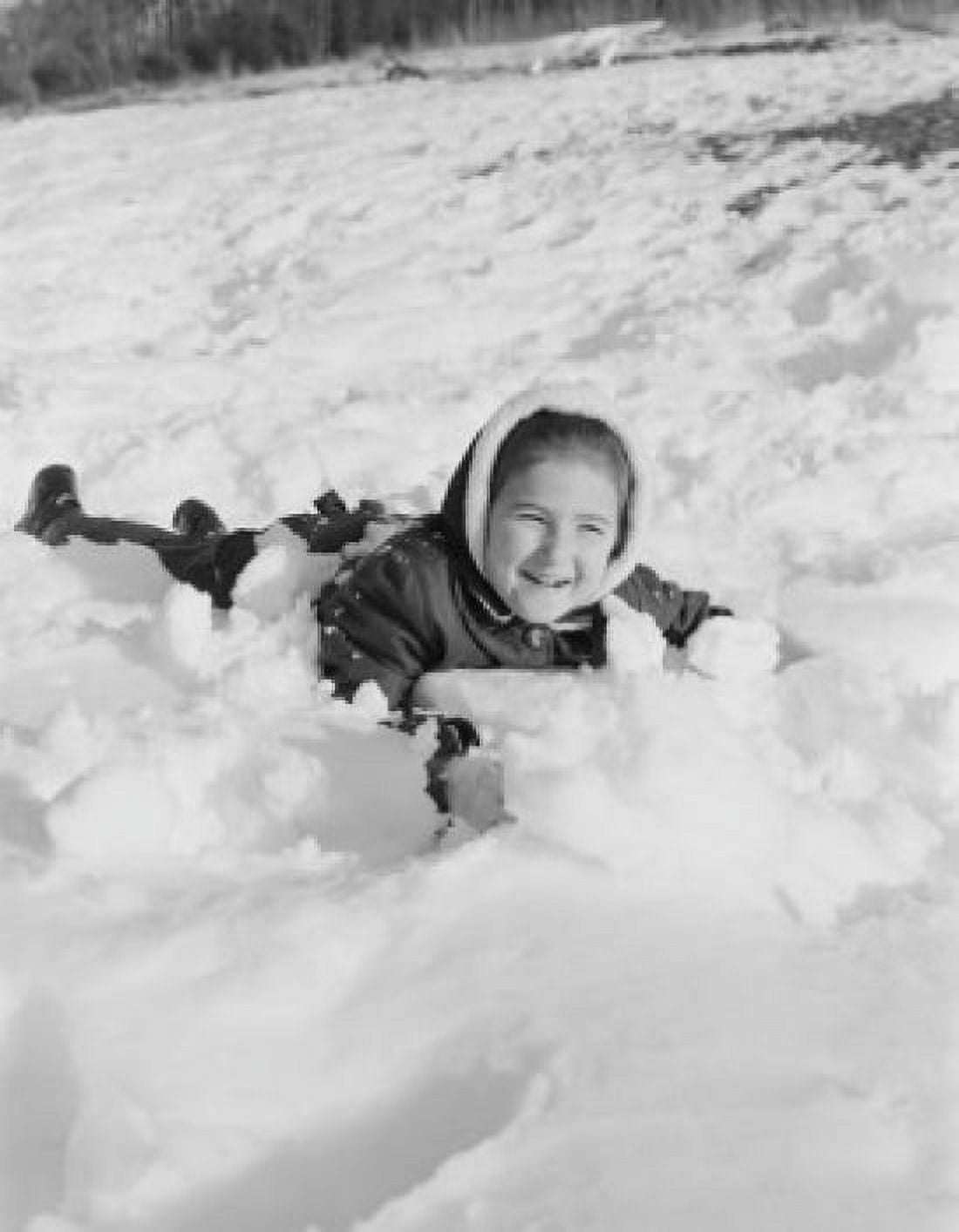 Girl playing in snow Canvas Art - (24 x 36)