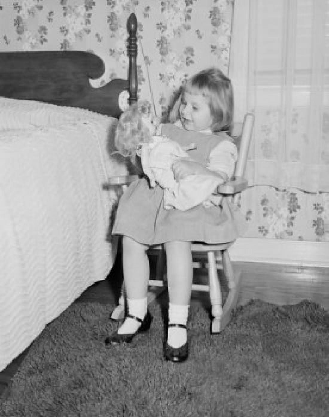 Girl playing with doll beside bed Canvas Art - (24 x 36)