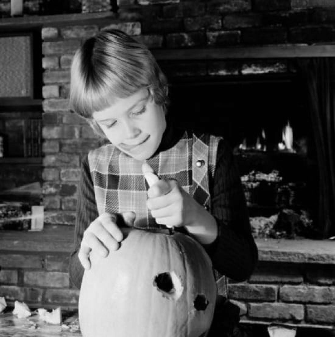 Girl preparing pumpkin for Halloween Canvas Art - (24 x 36)