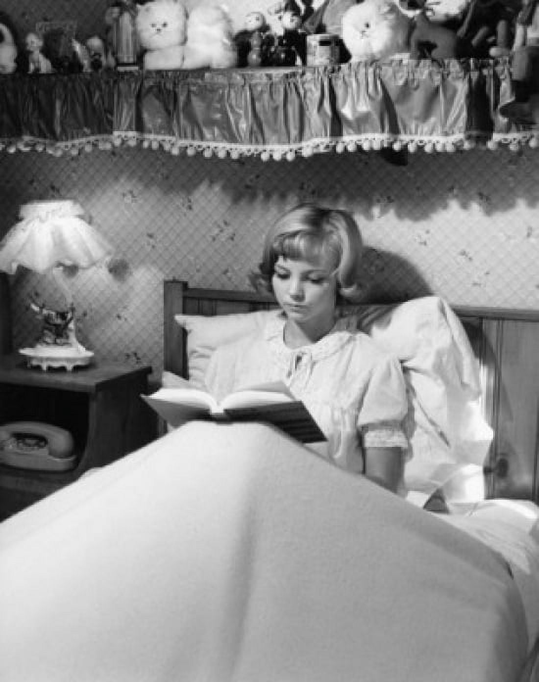 Girl reading in bed Canvas Art - (18 x 24)