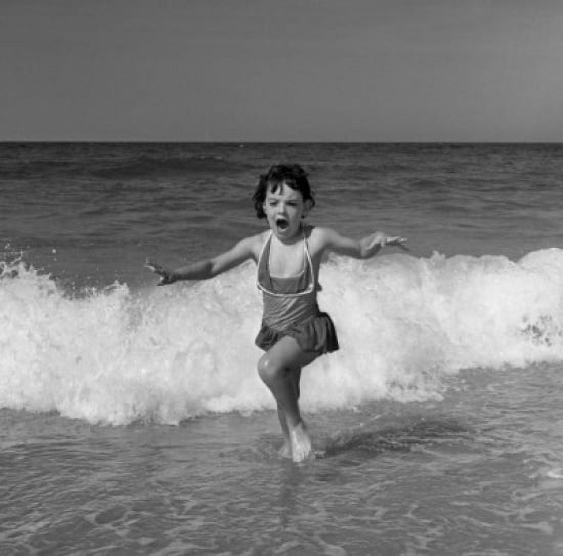 Girl running on beach Canvas Art - (24 x 36)