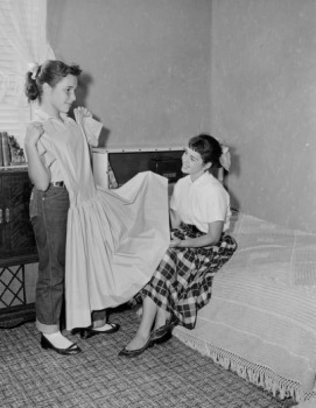 Girl showing mother dress in bedroom Canvas Art - (18 x 24)