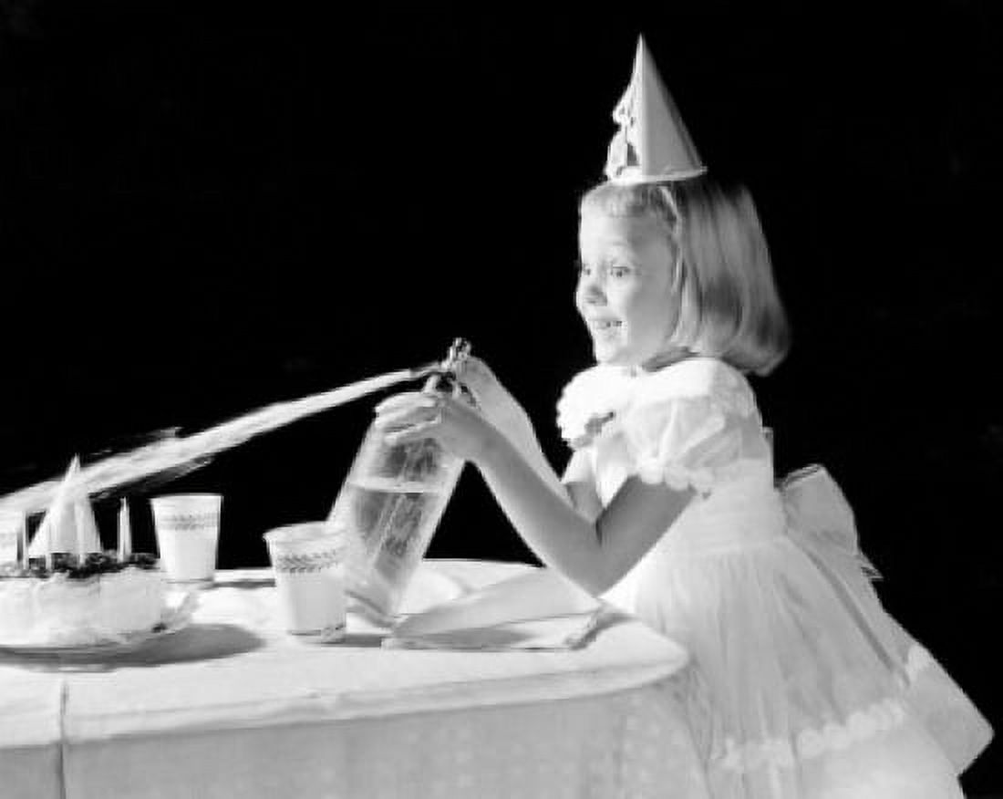 Girl splashing soda at birthday party Canvas Art - (24 x 36)
