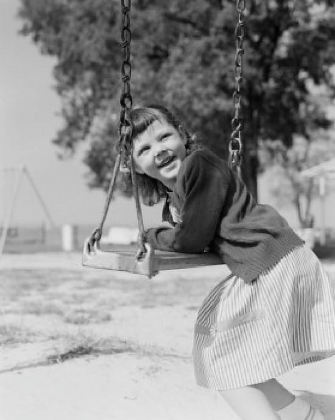 Girl swinging and laughing Canvas Art - (18 x 24)