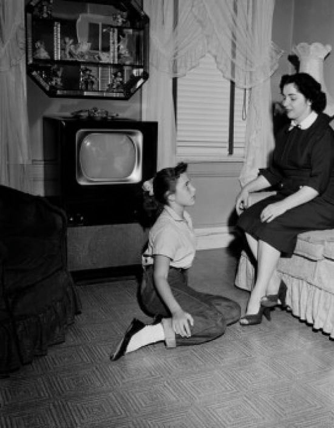 Girl talking with mother in living room Canvas Art - (18 x 24)