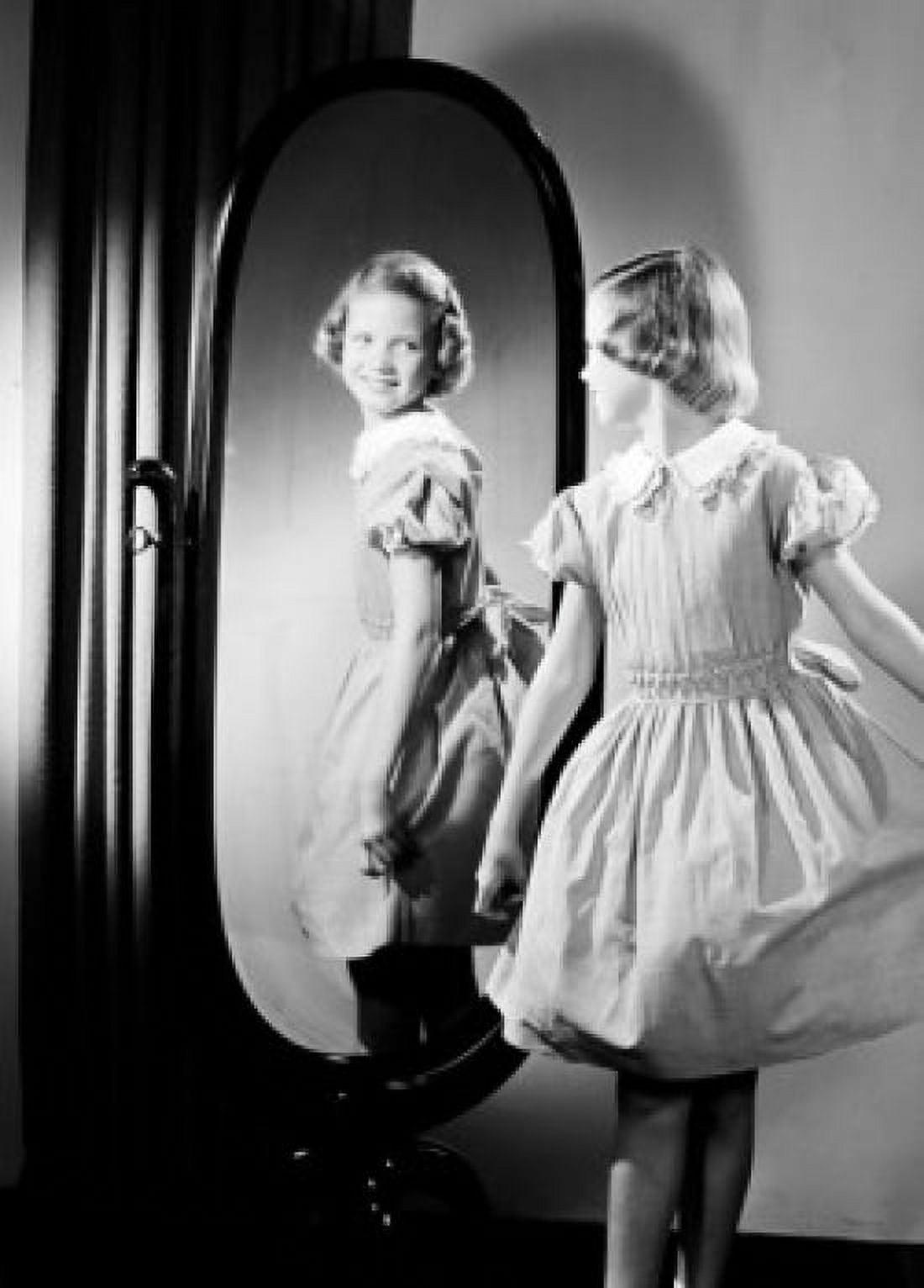 Girl trying on dress in front of mirror Canvas Art - (18 x 24)