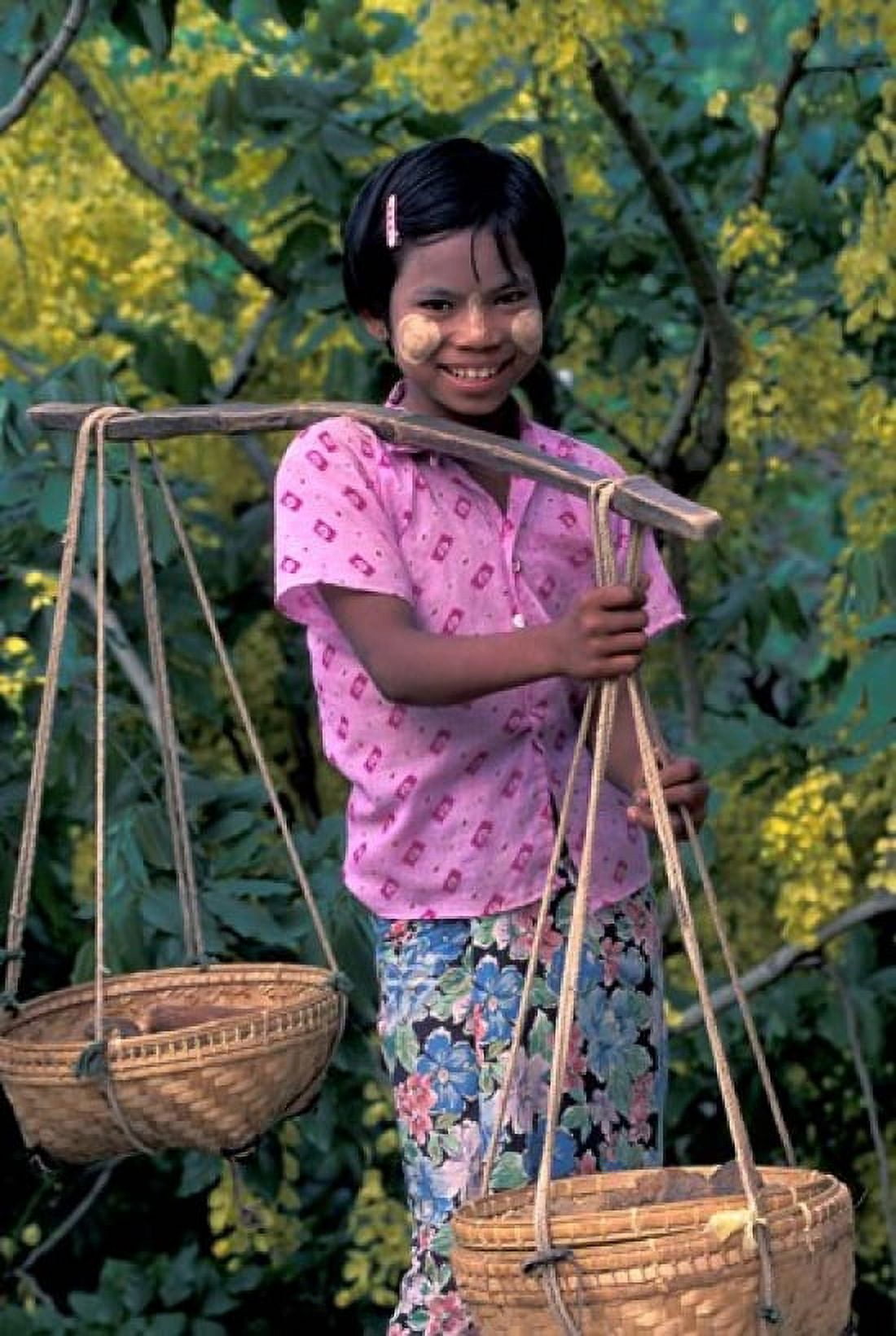 Girl with Painted Face Carrying Basket on Shoulder Pole Myanmar Canvas Art - Keren Su DanitaDelimont (24 x 36)