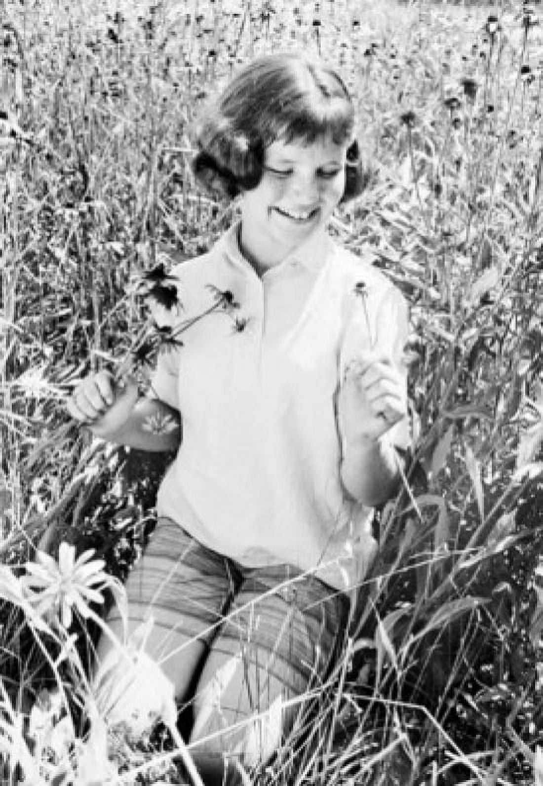 Girl with flowers on meadow Canvas Art - (24 x 36)