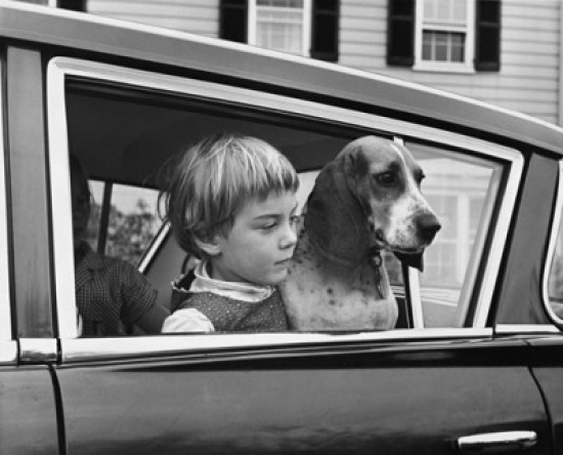 Girl with her dog in car looking through window Canvas Art - (24 x 36)