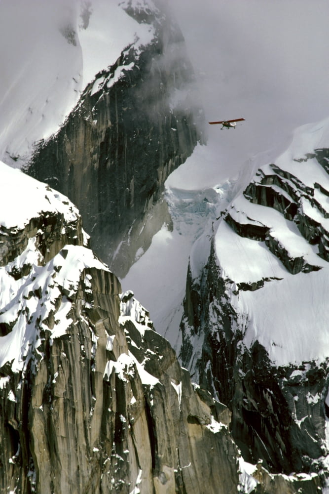 Glacier Pilot & Plane In Ak Range Mooses Tooth In Ak Canvas Art - Jeff Schultz  Design Pics (22 x 34)