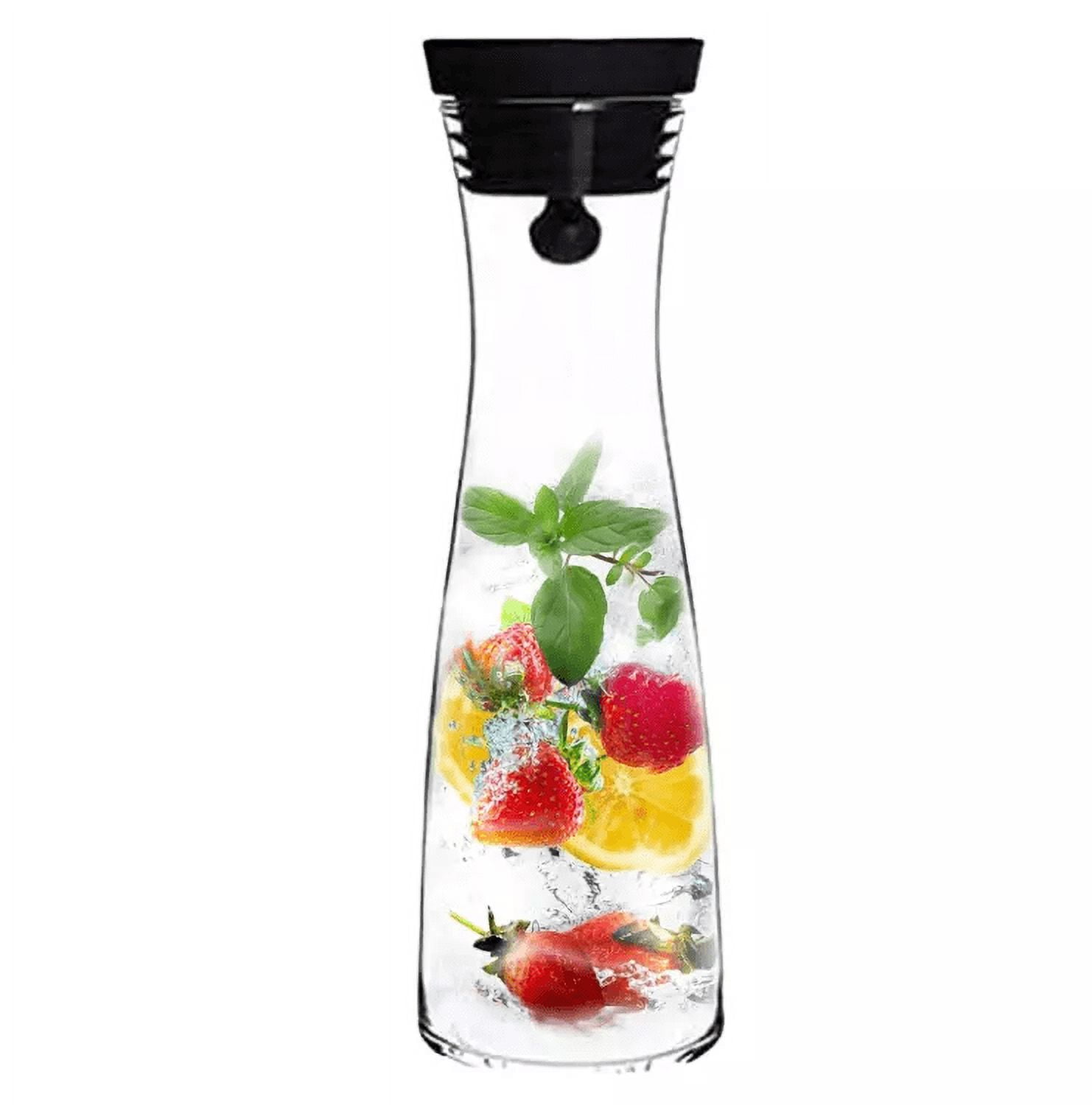 https://i5.walmartimages.com/seo/Glass-Carafe-with-lid-Pitcher-with-Lid-Glass-Decanter-Bedside-carafe-Carafe-Glass-water-carafe_7e8047f4-74dd-4ed5-8218-c0754a9fce2f.382f0332792760d3b57cf56405f040fb.jpeg