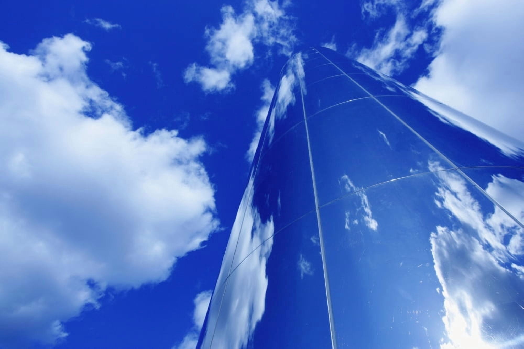 Glass Obelisk With Blue Sky And Cloud Reflections Canvas Art - Chris Martin Design Pics (38 x 24)