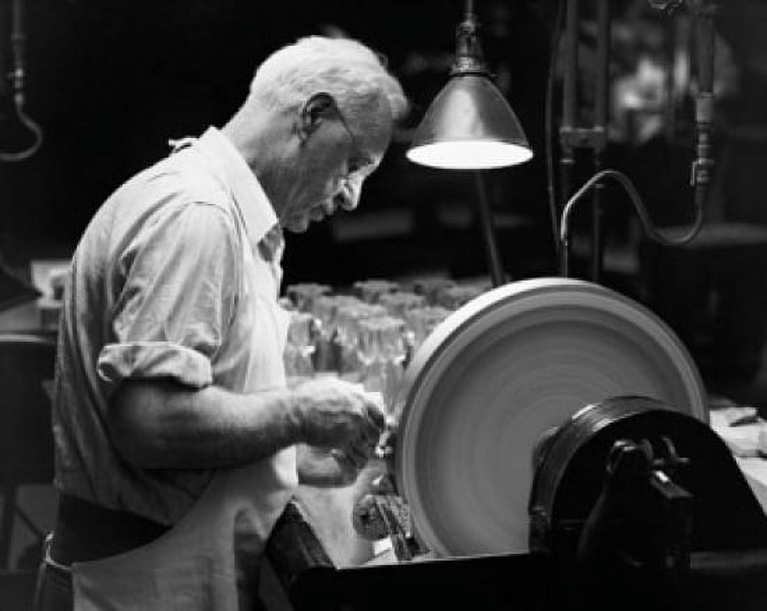 Glass engraver working on a grinding stone Canvas Art - (18 x 24)