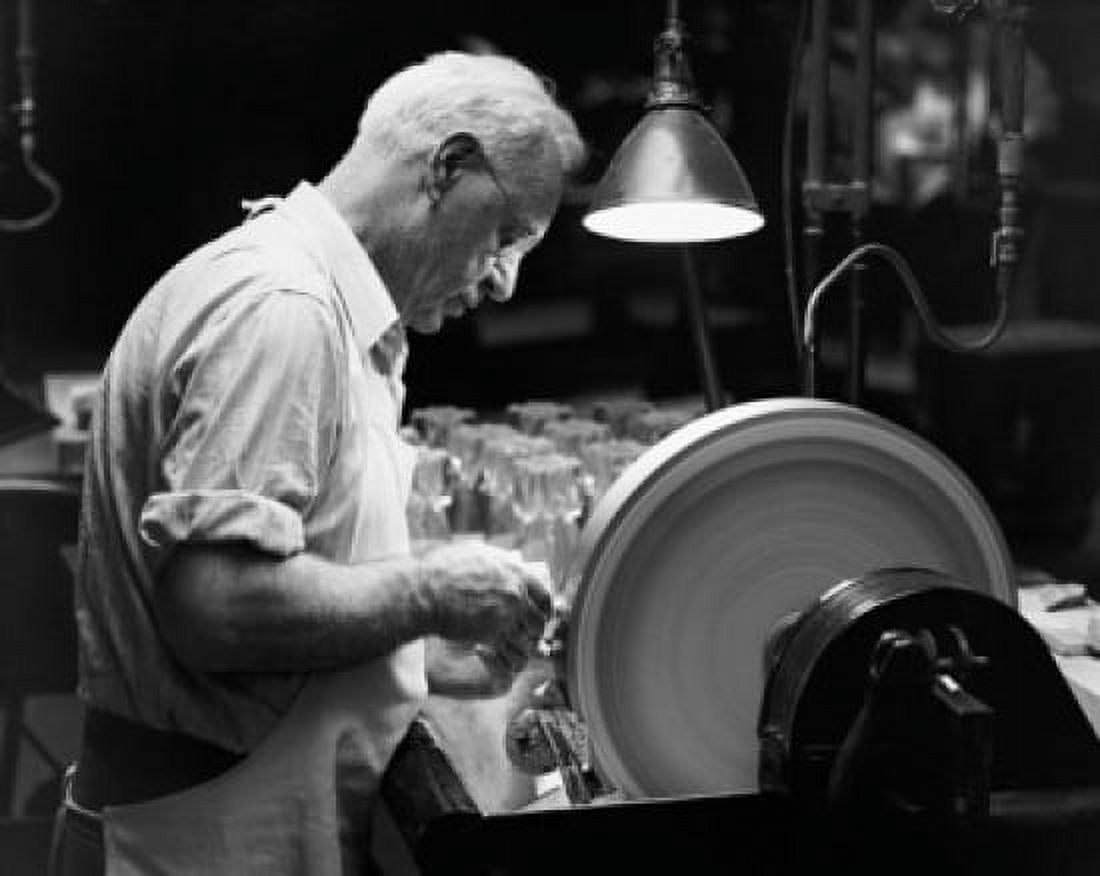 Glass engraver working on a grinding stone Canvas Art - (24 x 36)