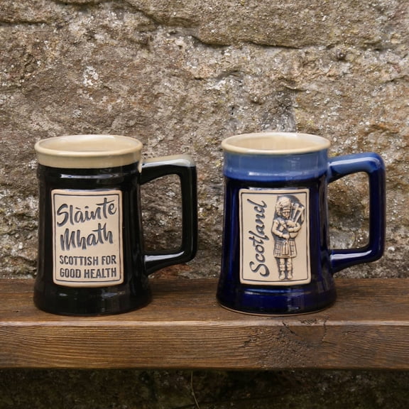 Glen Appin Stoneware Beer Mugs Set of 2 - Slainte Mhath and Piper Symbols of Scotland Design, Black and Blue